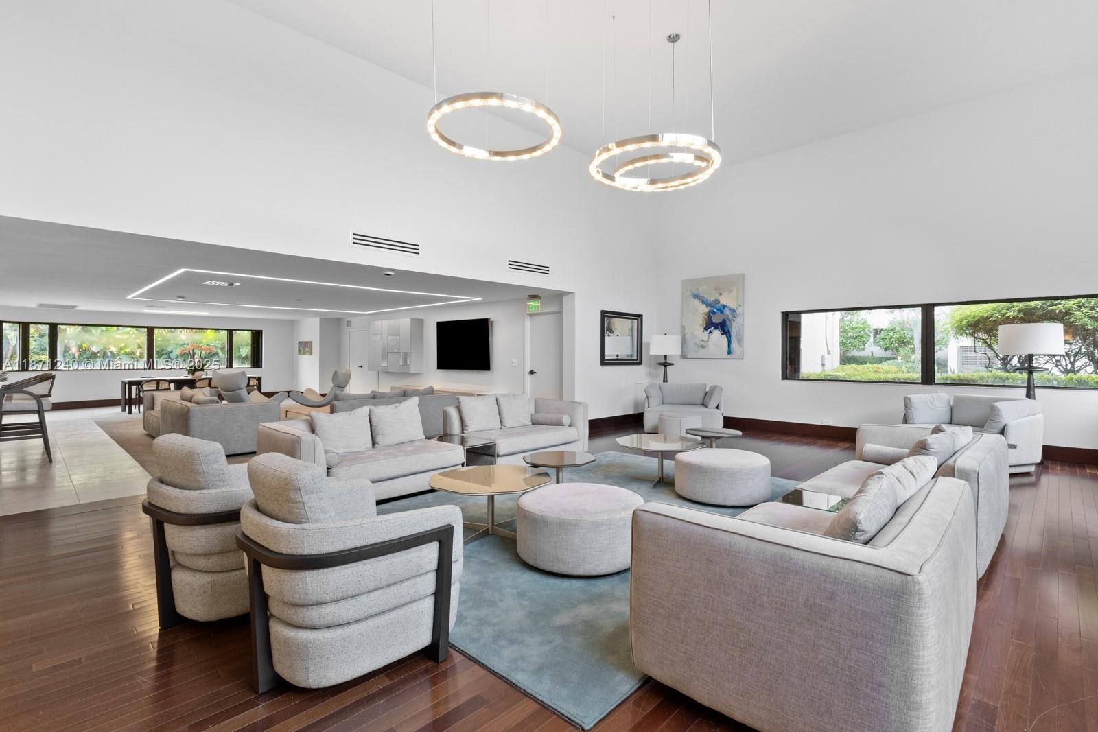 251 Crandon Boulevard, Unit 1036 Key Biscayne, FL 33149 - Photo 26 of 38 a living room with furniture and a large window