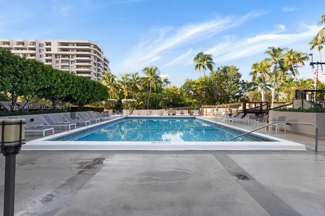 a view of swimming pool with a yard