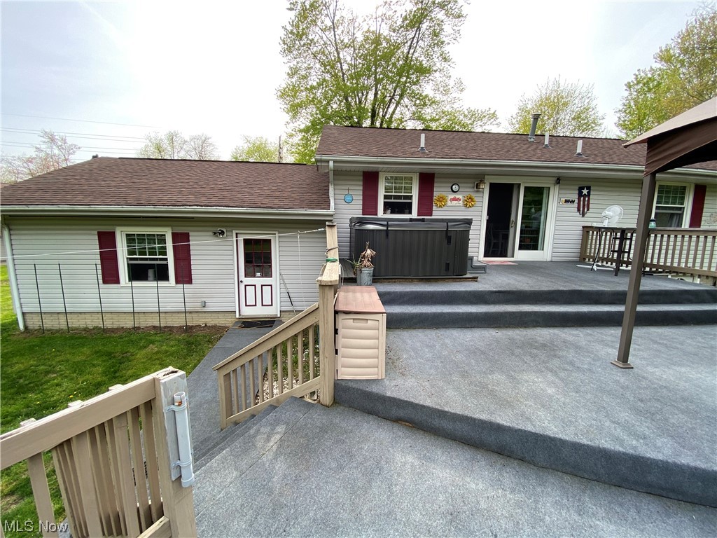 7500 Sanborn Road Ashtabula, OH 44004 - Photo 5 of 26 Rear View, Back Deck, Hot Tub, Pergola.