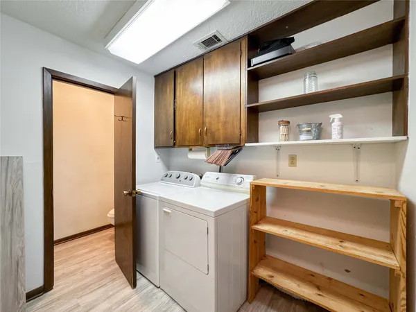 a utility room with washer and dryer