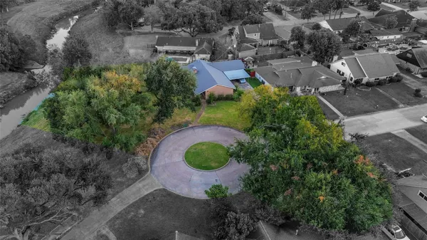 an aerial view of a house with garden
