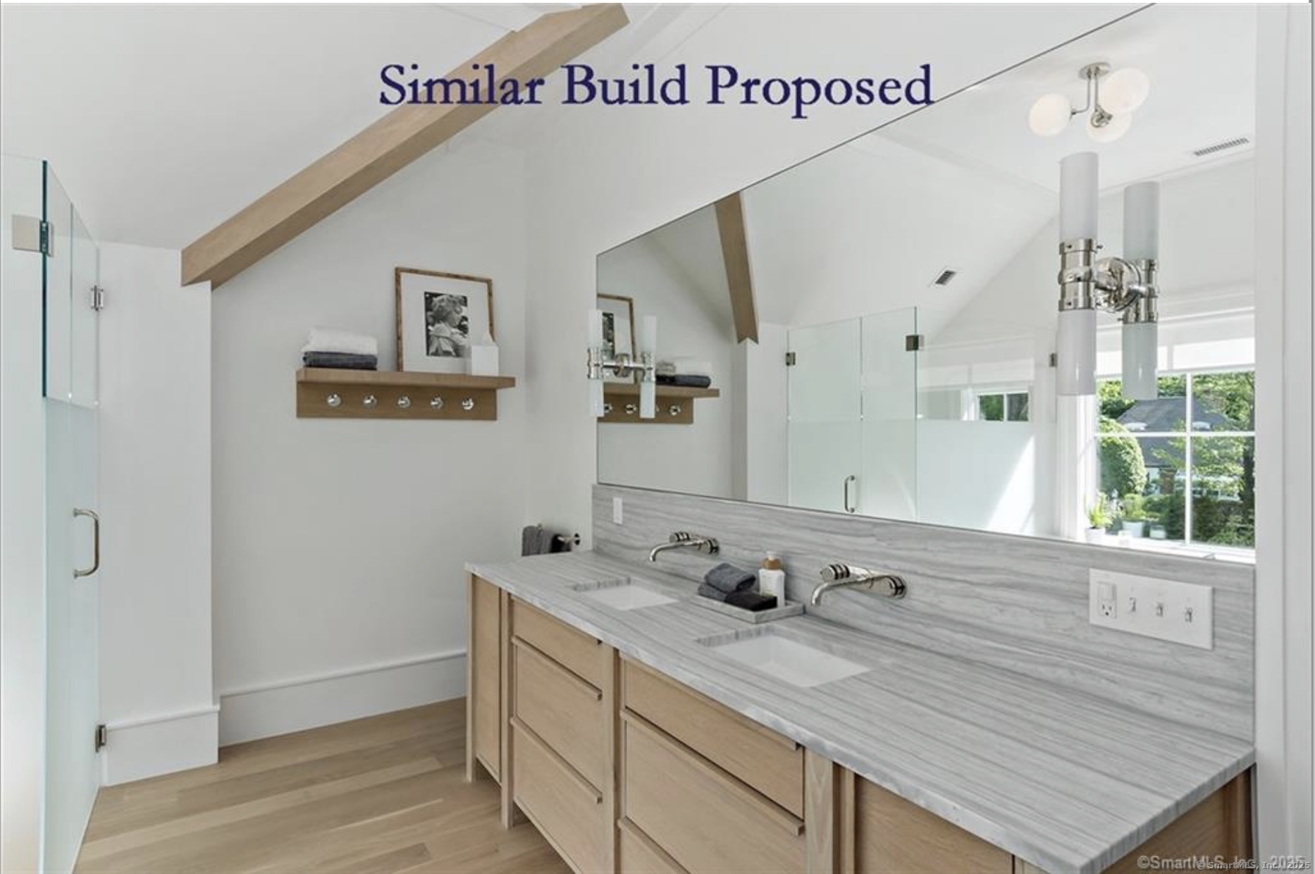 22 Brett Road Fairfield, CT 06824 - Photo 7 of 9 a bathroom with a sink and a mirror