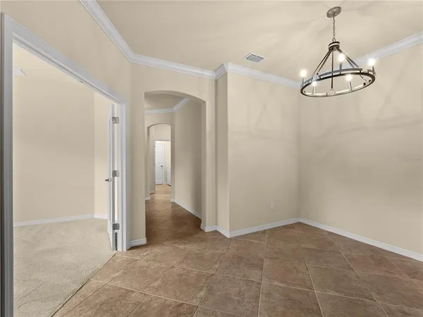 a view of a room with rack and wooden floor