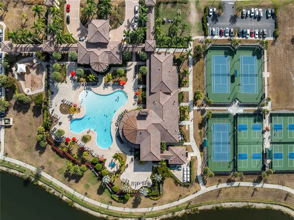 an aerial view of a house with a ocean view