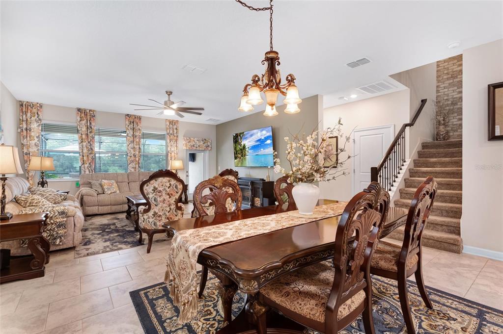 1089 Blackwolf Run Road Davenport, FL 33896 - Photo 14 of 82 a view of a livingroom and dining room