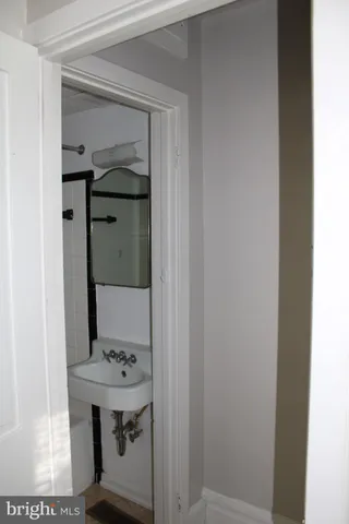 a bathroom with a mirror