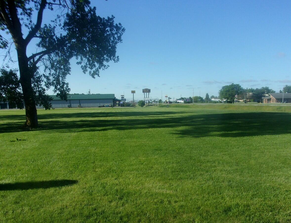 a view of a golf course with a garden