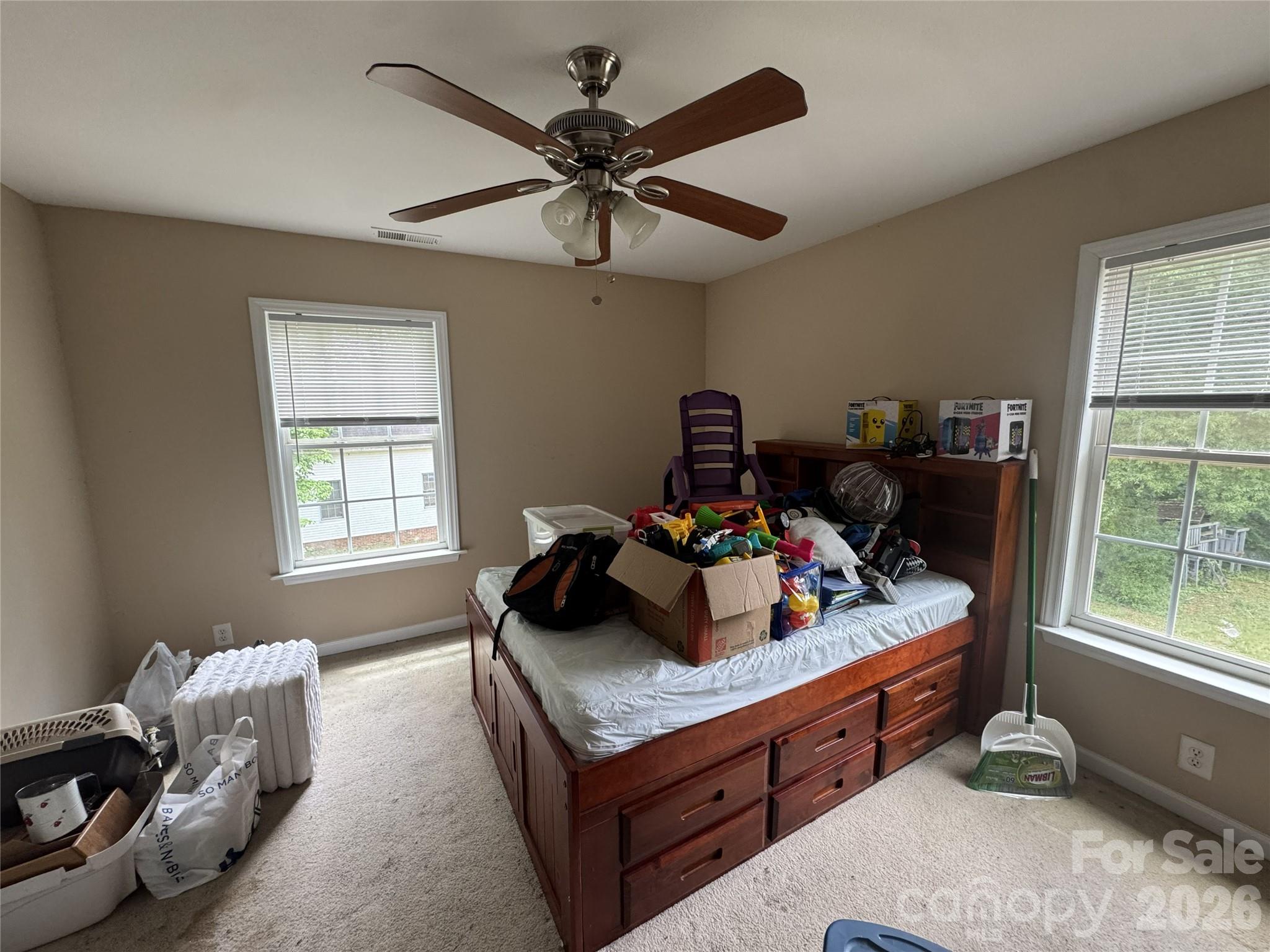 8441 Shelley Mullis Road Fort Mill, SC 29707 - Photo 12 of 23 a living room with furniture and a window