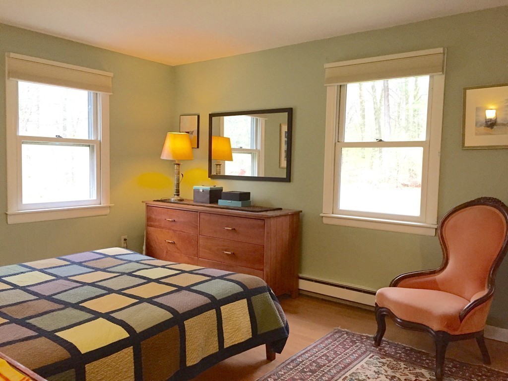 14 Gulf Road Pelham, MA 01002 - Photo 16 of 30 a bedroom with a bed and a window