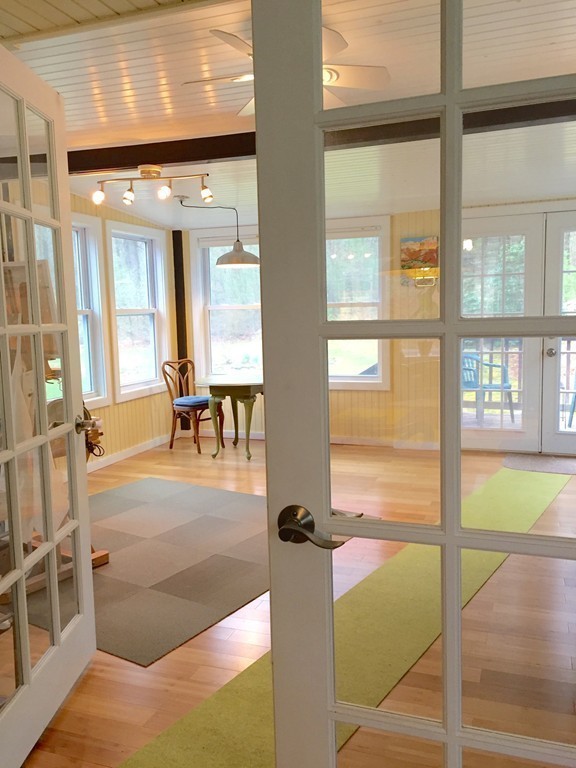 14 Gulf Road Pelham, MA 01002 - Photo 6 of 30 a lobby with furniture and floor to ceiling window