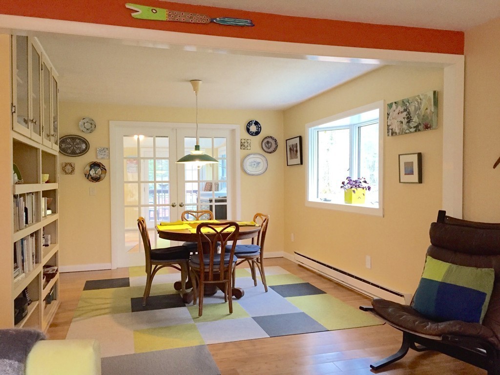 14 Gulf Road Pelham, MA 01002 - Photo 9 of 30 a view of a dining room with furniture a rug and wooden floor