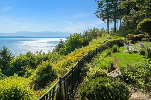a view of a garden with a lake