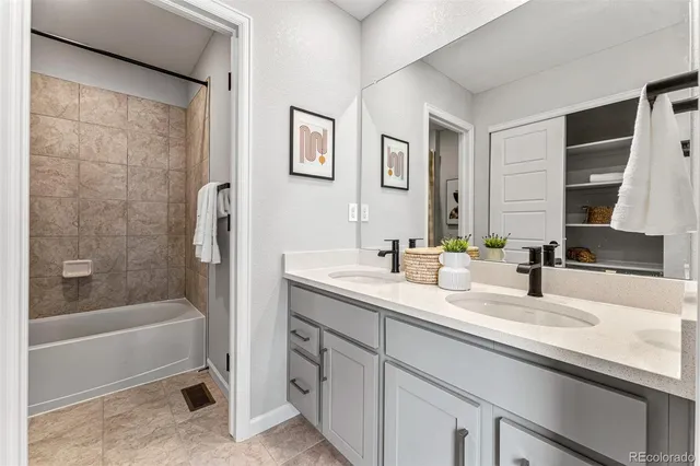 a bathroom with a toilet and a bathtub