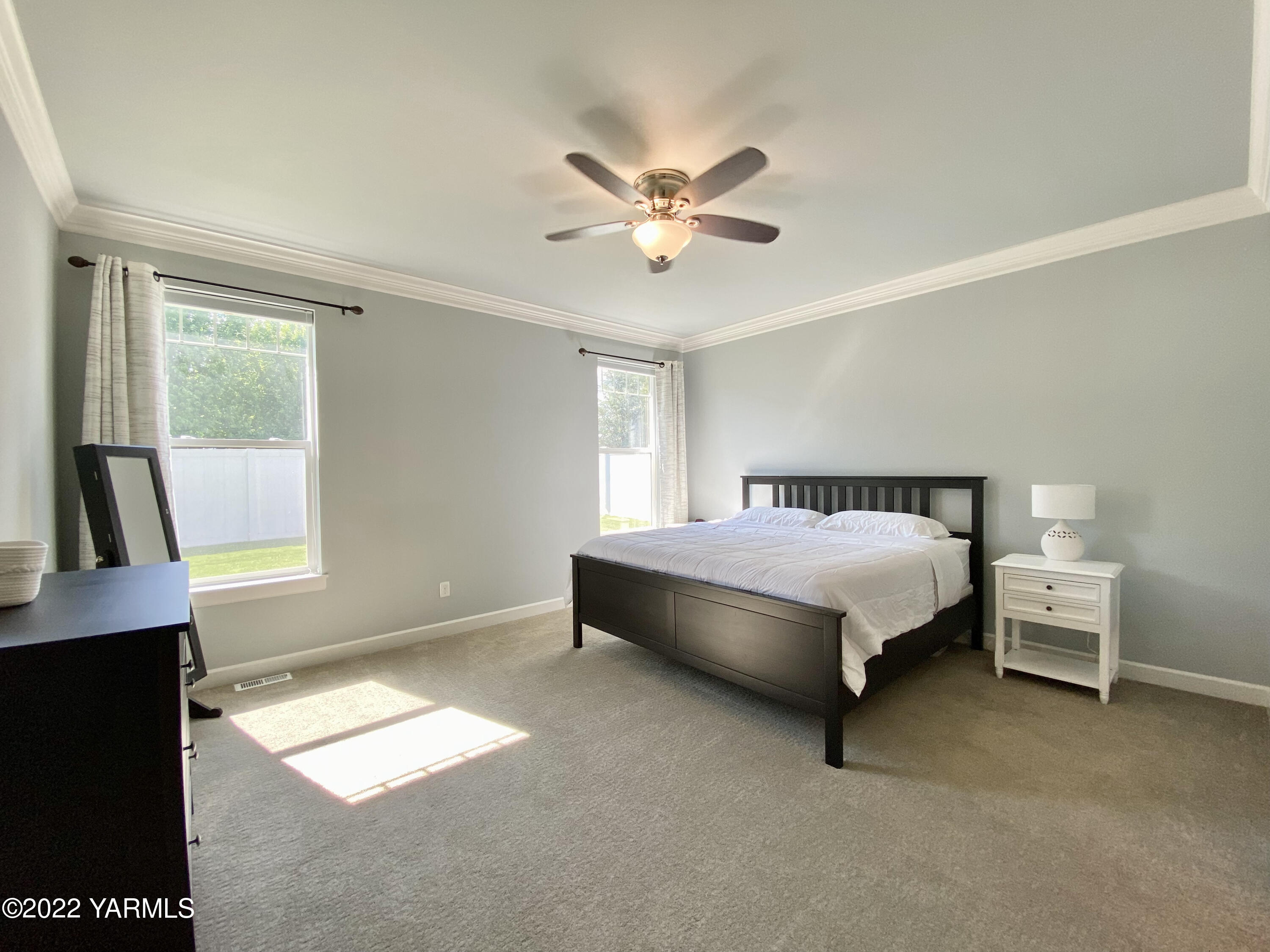 2110 Ruby Way Yakima, WA 98903 - Photo 13 of 36 a bedroom with a bed and a window