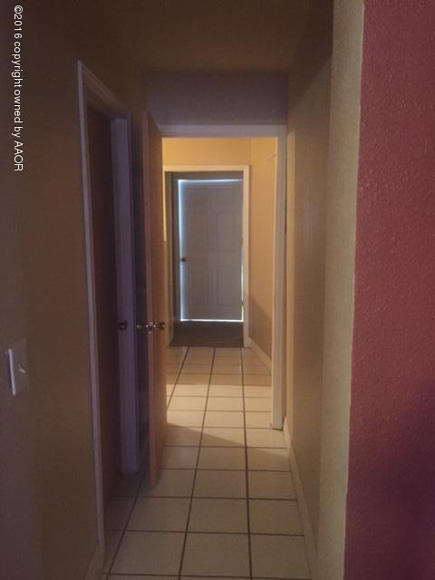 4223 South Washington Street Amarillo, TX 79110 - Photo 14 of 15 view of an empty room with a bathroom