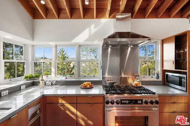 a view of cabinets and wooden floor