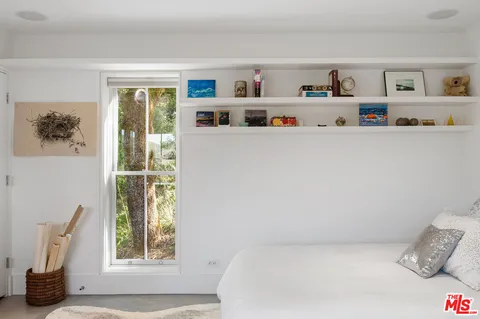 a view of a porch with wooden floor and outdoor space