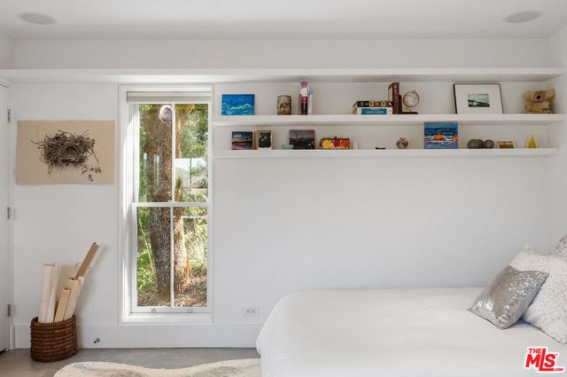 a view of a porch with wooden floor and outdoor space