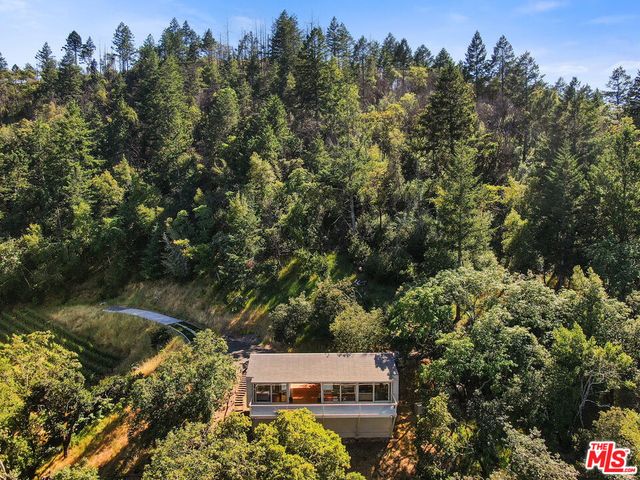 swimming pool view with a seating space