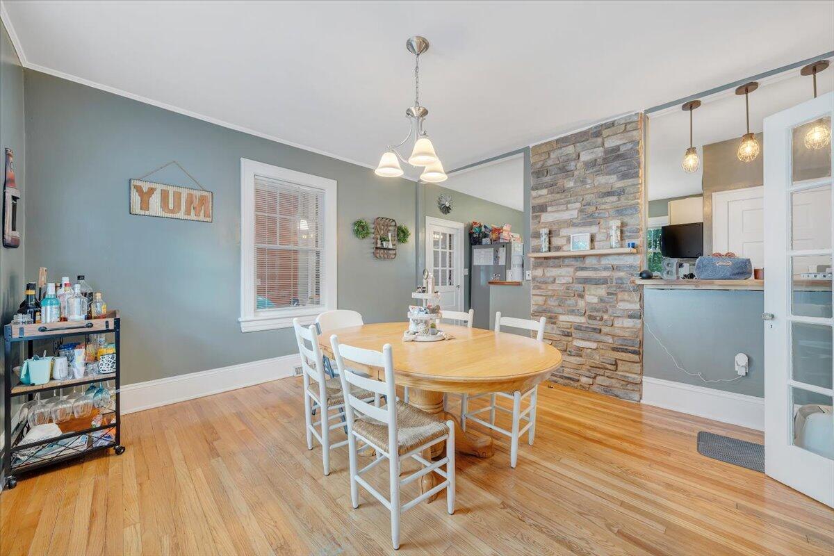 528 Riverland Road Southeast Roanoke, VA 24014 - Photo 15 of 42 a view of a dining room with furniture and wooden floor