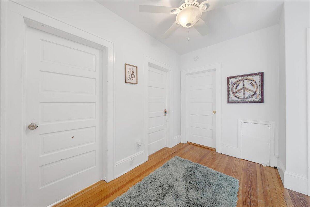 528 Riverland Road Southeast Roanoke, VA 24014 - Photo 20 of 42 a view of a bedroom with wooden floor and closet