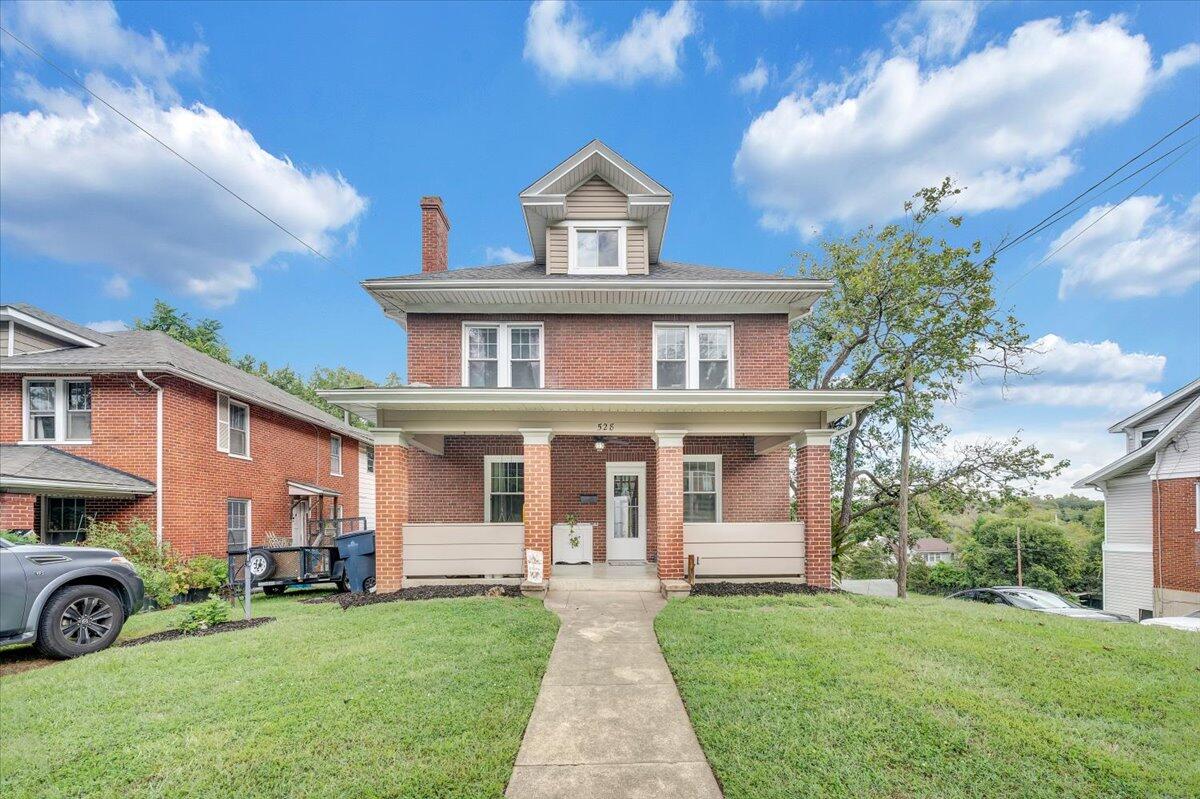 528 Riverland Road Southeast Roanoke, VA 24014 - Photo 2 of 42 a front view of a house with a garden and plants
