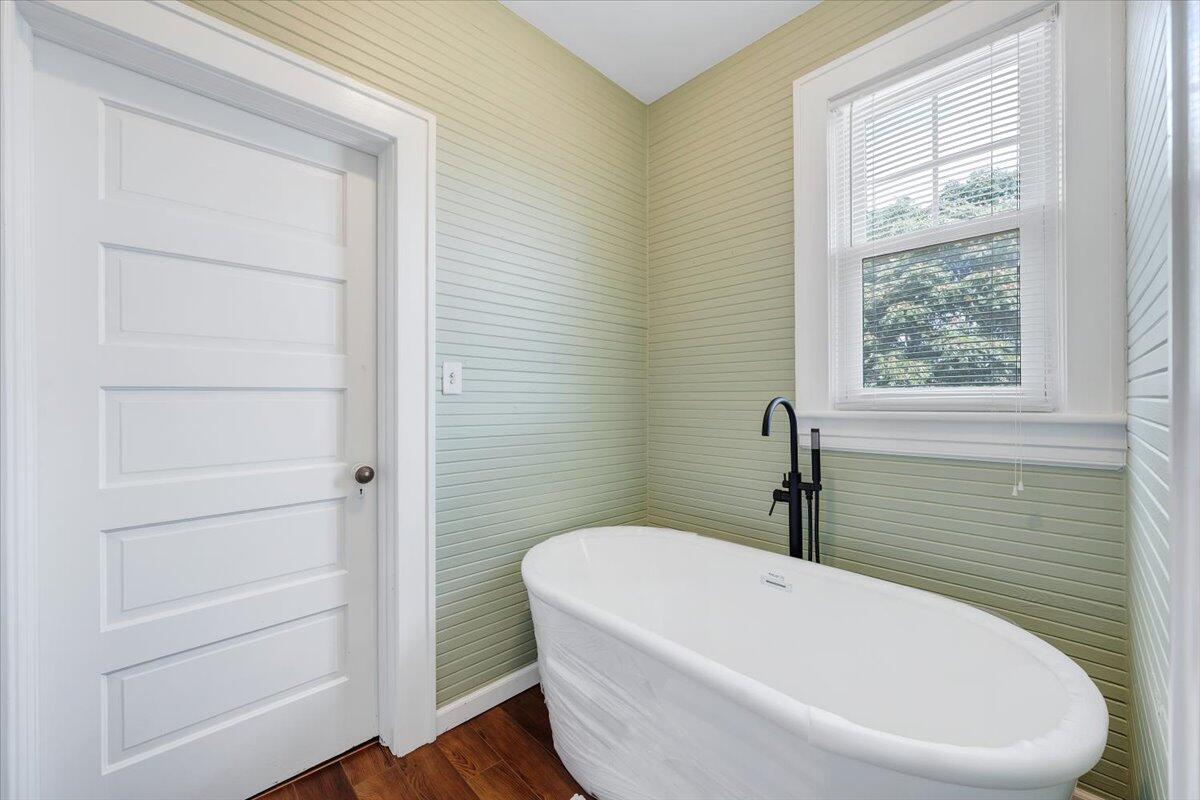 528 Riverland Road Southeast Roanoke, VA 24014 - Photo 29 of 42 a white bath tub sitting next to a white toilet