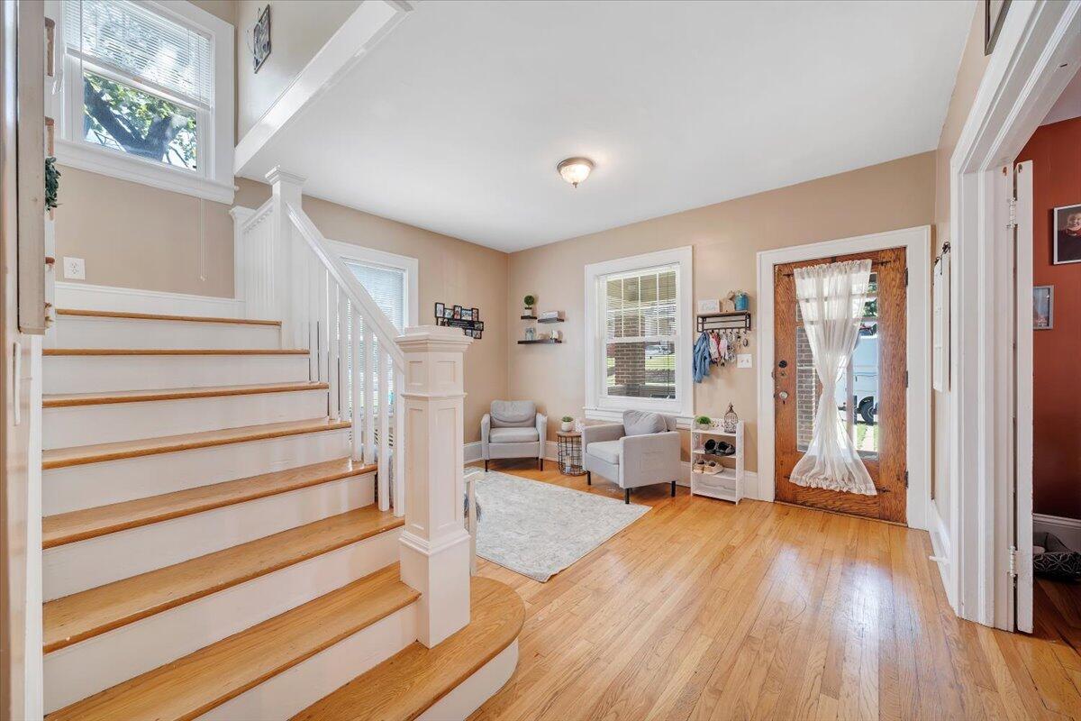 528 Riverland Road Southeast Roanoke, VA 24014 - Photo 5 of 42 a living room with furniture and a wooden floor