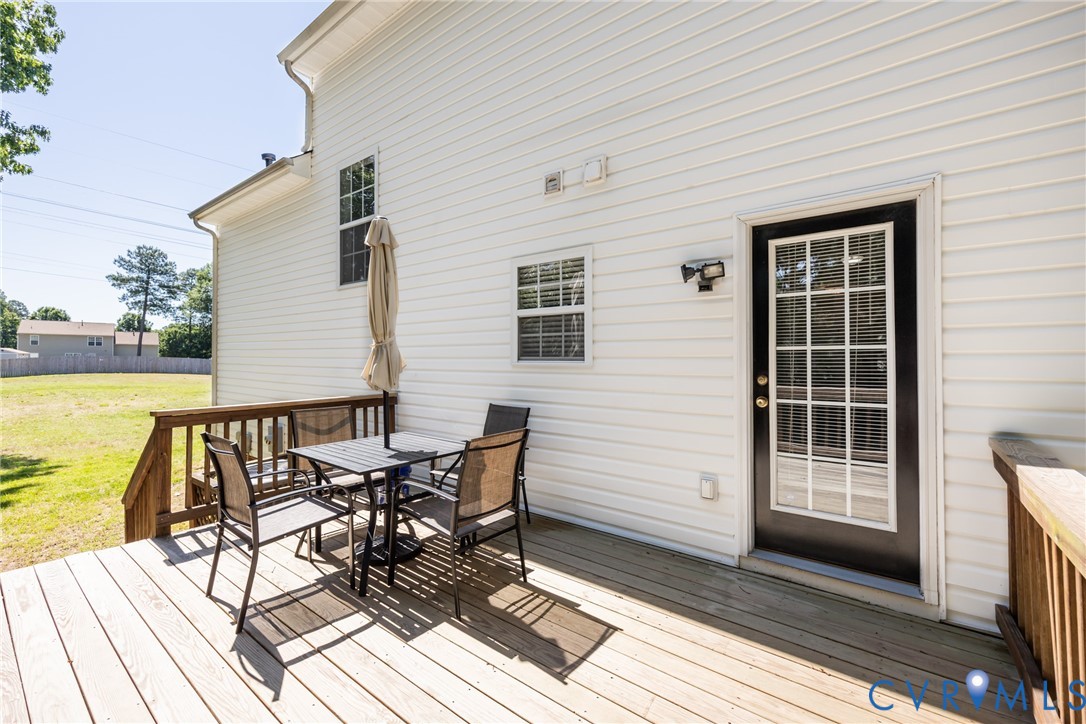 2928 Heather Ridge Drive Henrico, VA 23231 - Photo 4 of 34 Ground-level wood deck with natural wood railing,