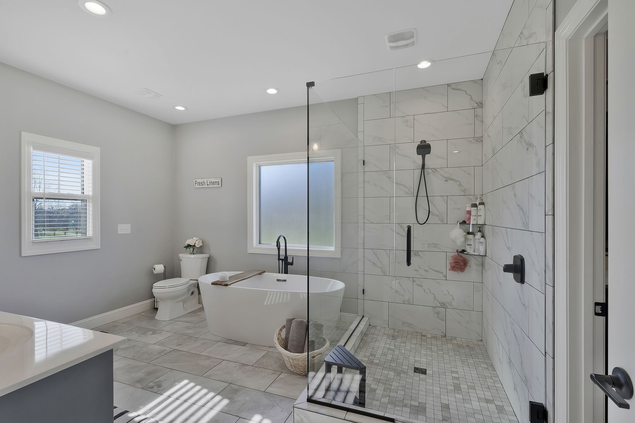 3125 Riley Creek Road Normandy, TN 37360 - Photo 22 of 53 a bathroom with a toilet a sink and shower