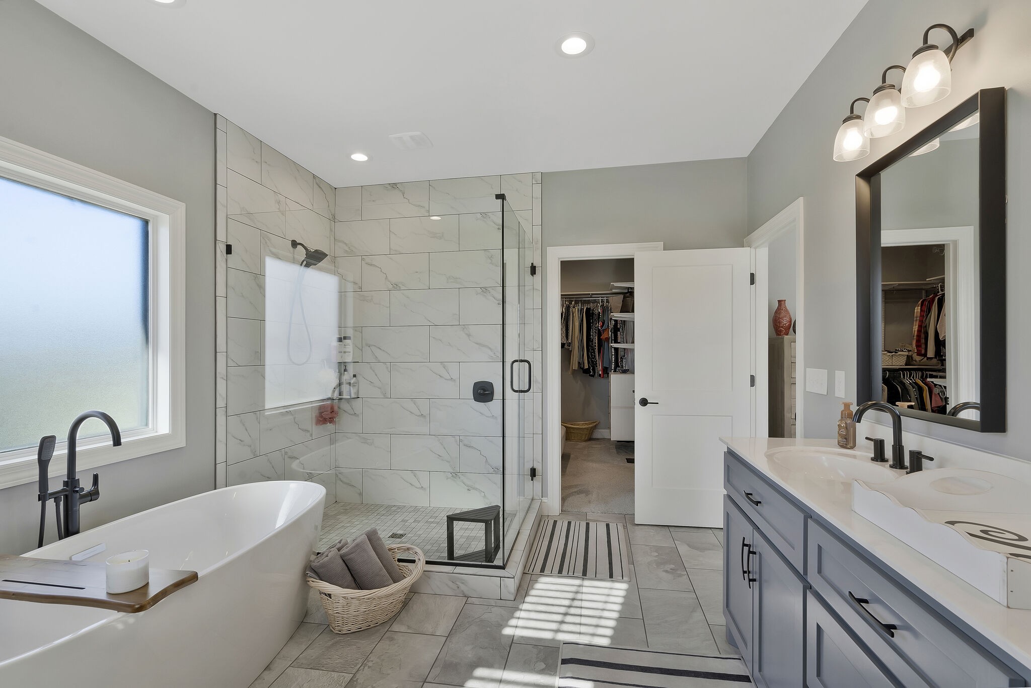 3125 Riley Creek Road Normandy, TN 37360 - Photo 24 of 53 a spacious bathroom with a double vanity sink toilet mirror and shower