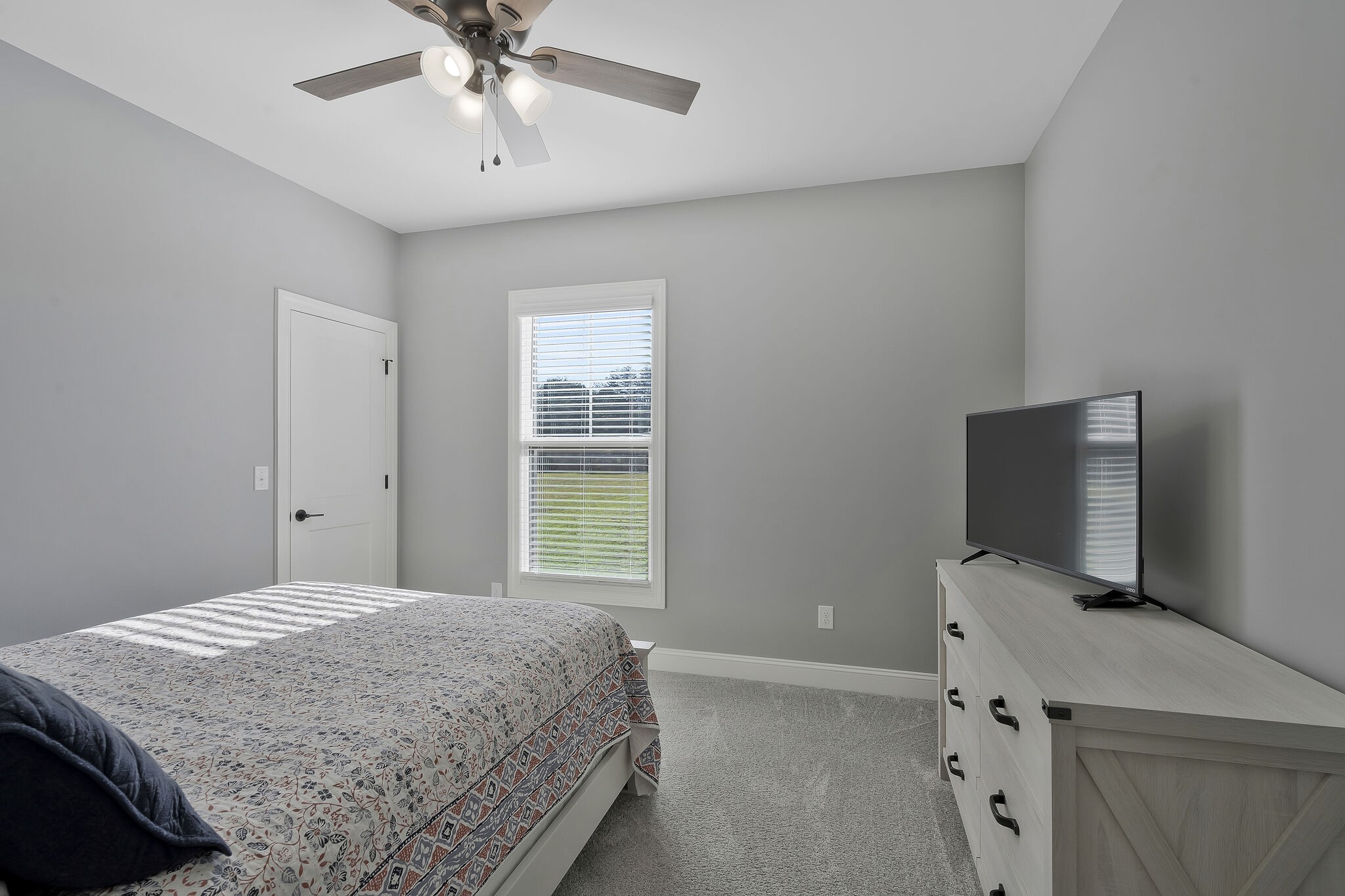 3125 Riley Creek Road Normandy, TN 37360 - Photo 28 of 53 a bedroom with a bed and a flat screen tv