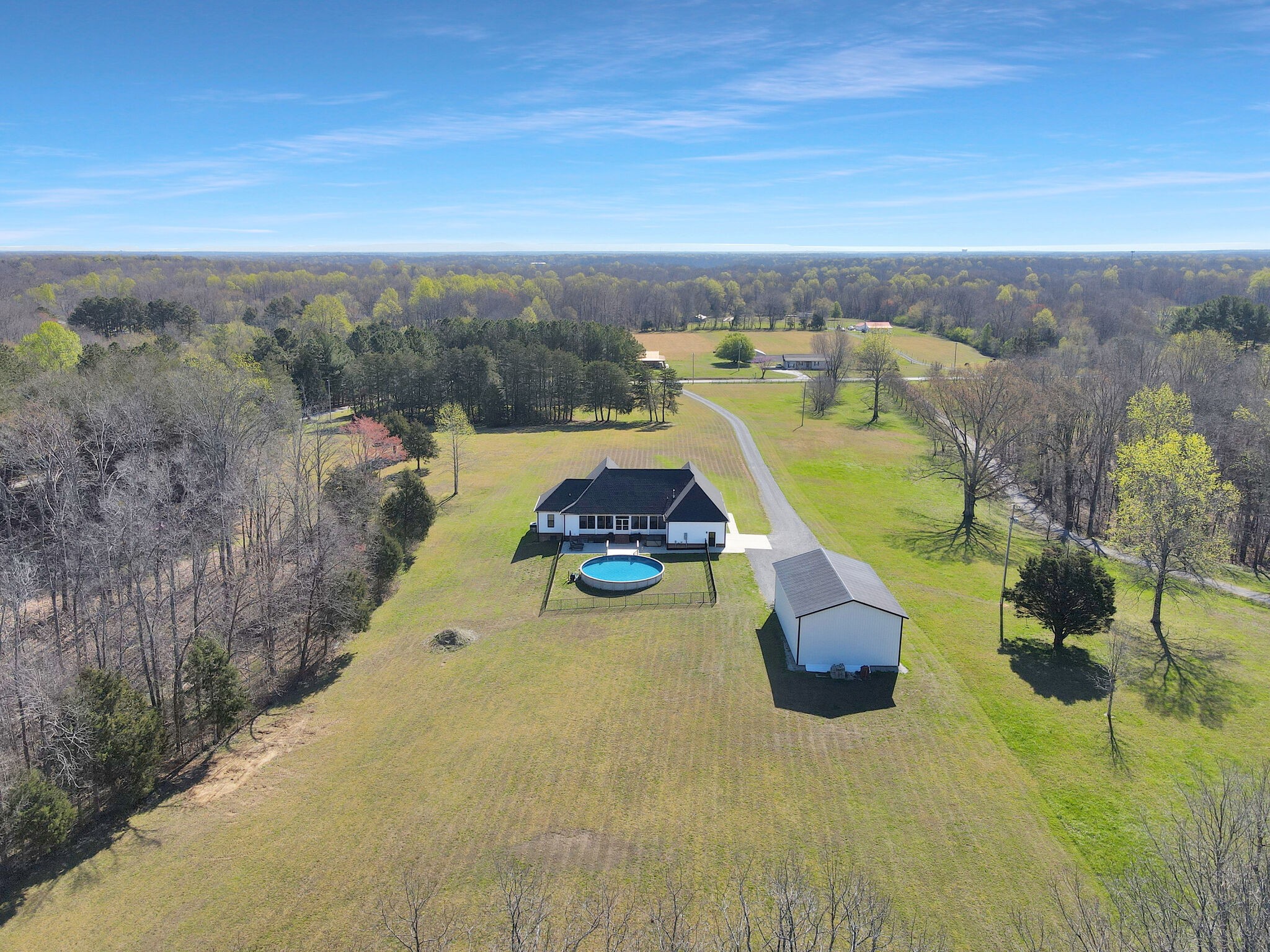 3125 Riley Creek Road Normandy, TN 37360 - Photo 47 of 53 a view of a swimming pool with an outdoor space and seating area