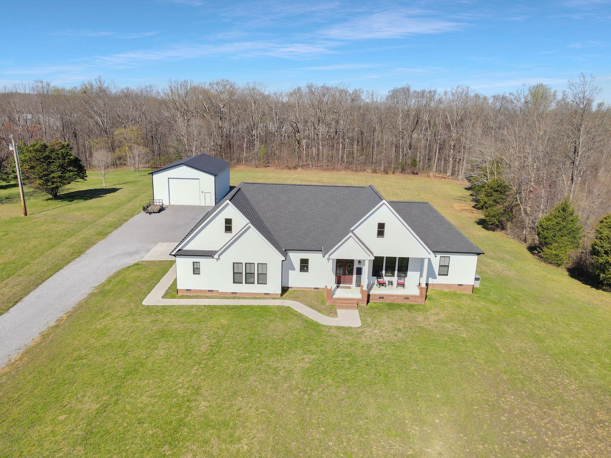 3125 Riley Creek Road Normandy, TN 37360 - Photo 49 of 53 a aerial view of a house with a big yard and large trees