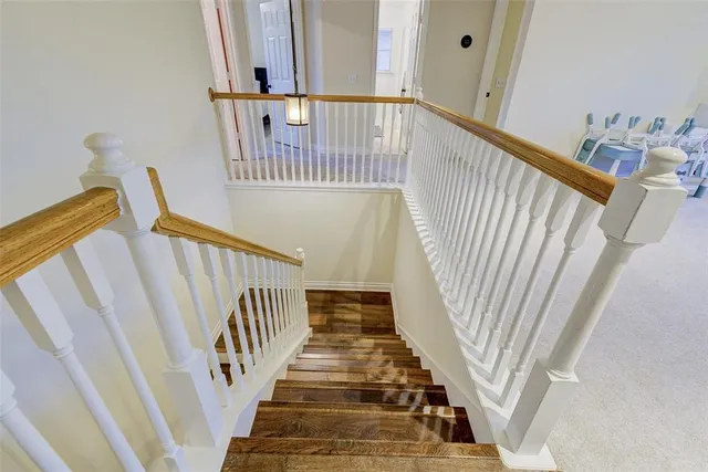 a view of a livingroom with furniture and a window