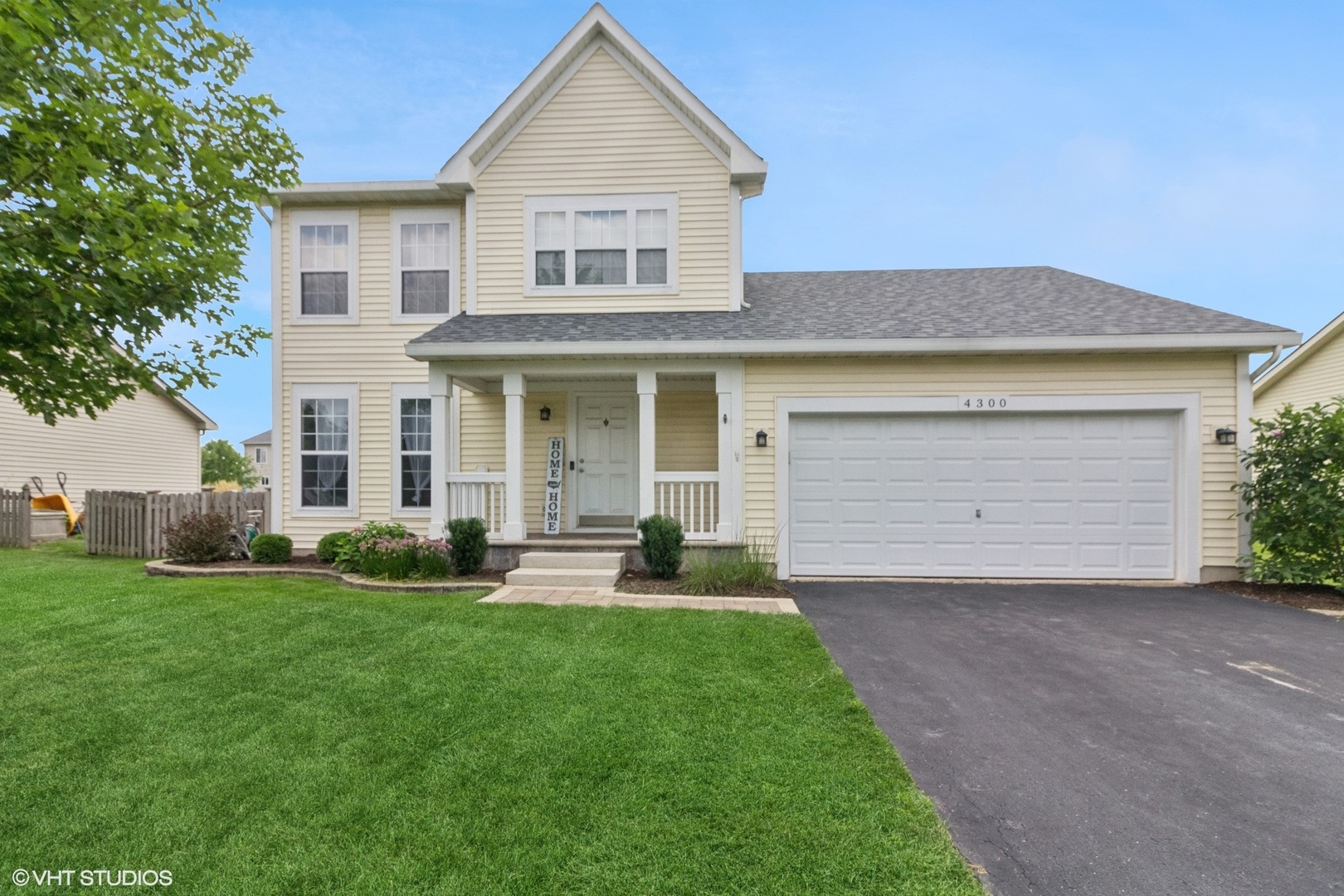 a view of a yard in front of a house