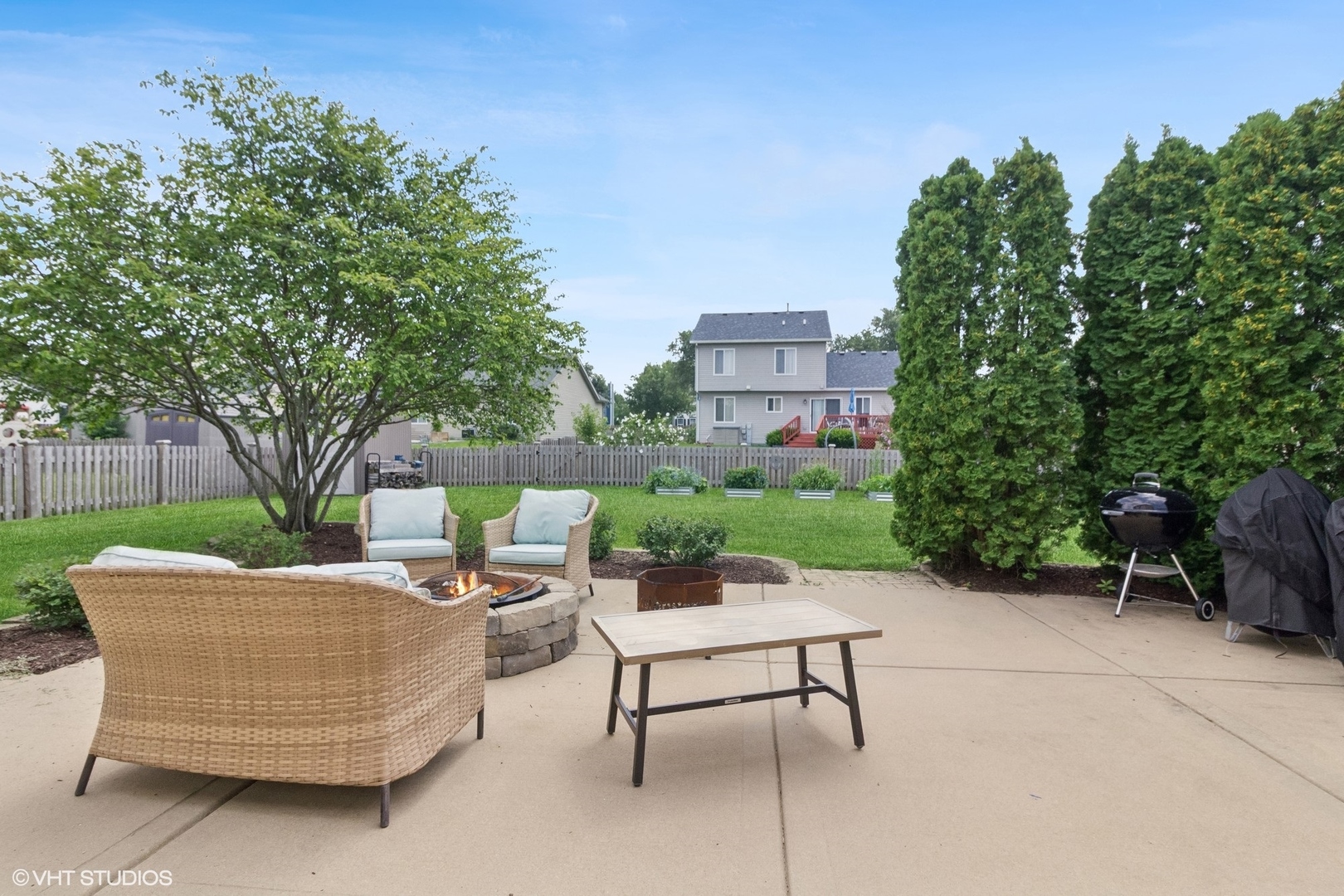 4300 Dobbins Street Plano, IL 60545 - Photo 23 of 31 a view of a patio with a table and chairs