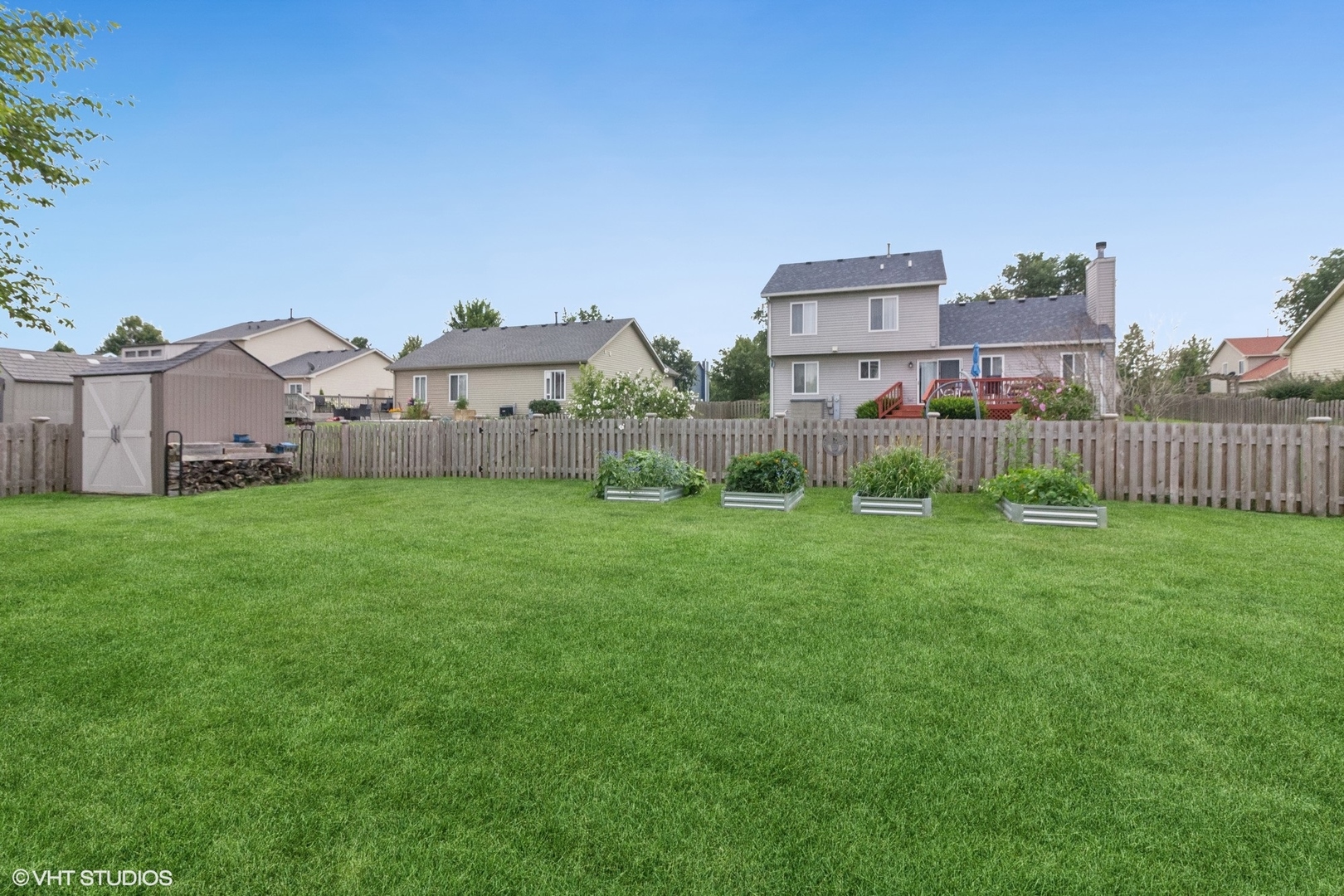 4300 Dobbins Street Plano, IL 60545 - Photo 25 of 31 a front view of house with yard and green space