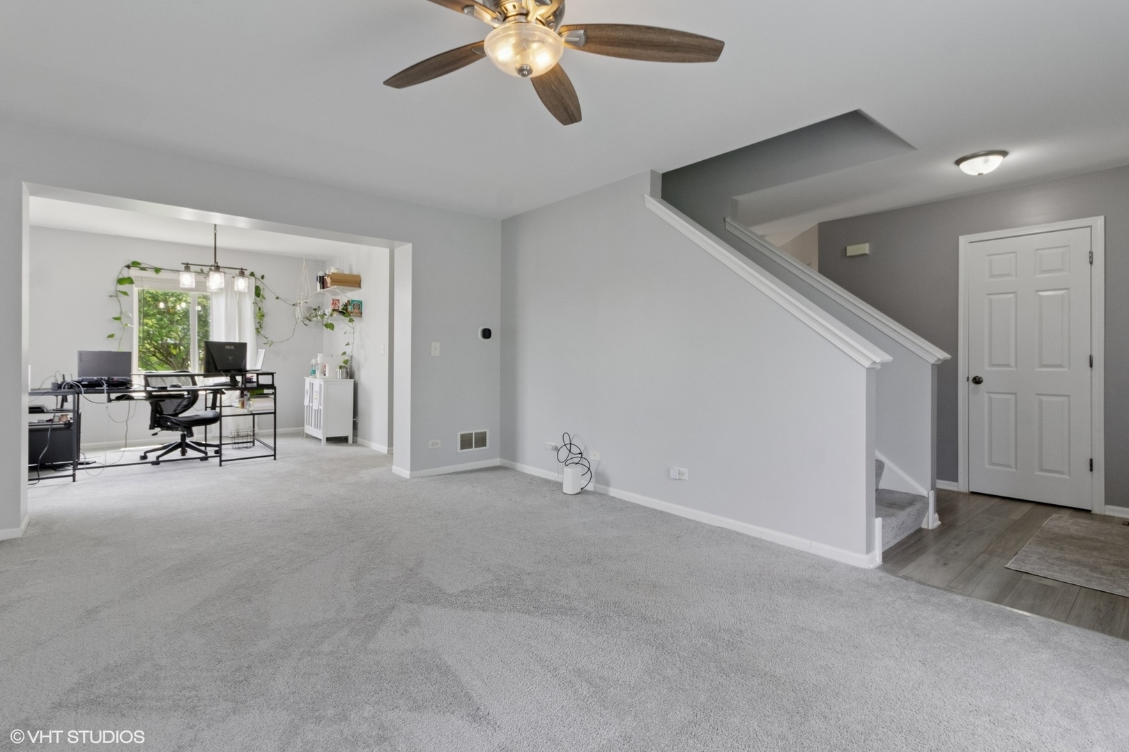 4300 Dobbins Street Plano, IL 60545 - Photo 3 of 31 an empty room with fan and windows