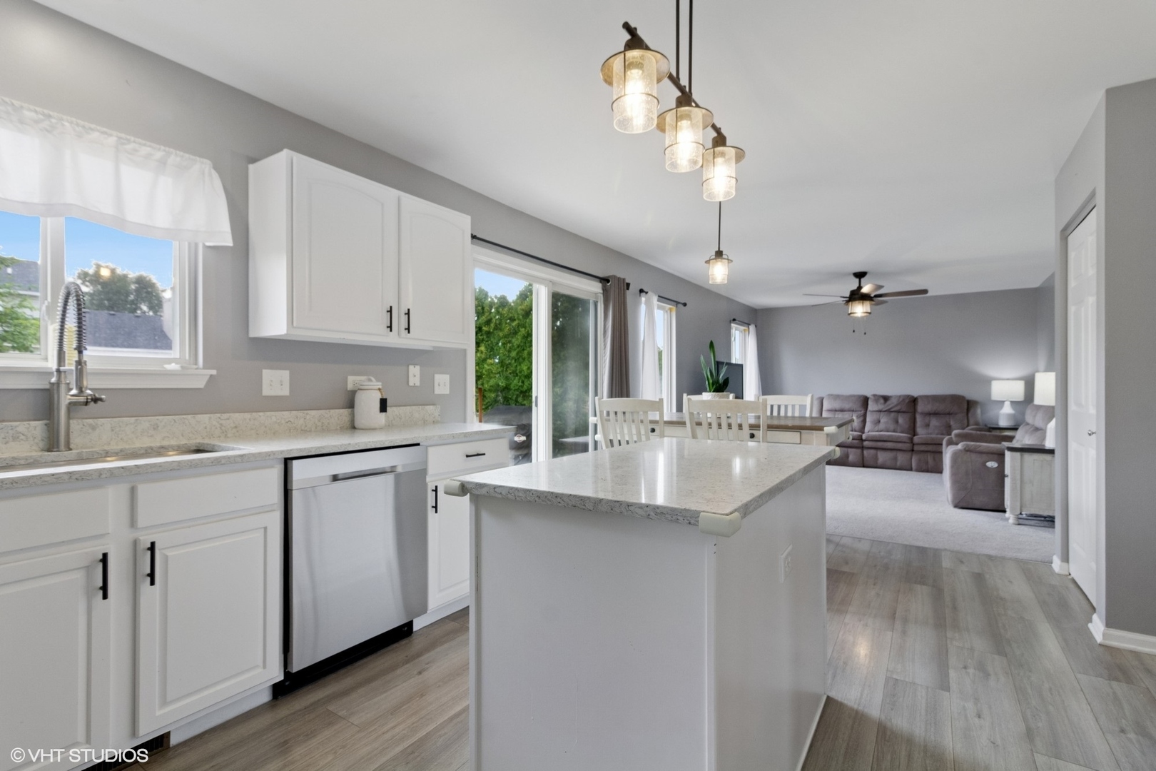 4300 Dobbins Street Plano, IL 60545 - Photo 9 of 31 a kitchen with counter top space sink stove and cabinets
