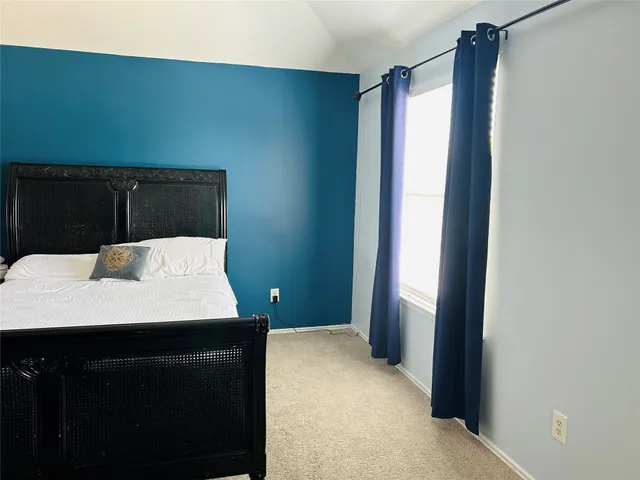 a view of a bathroom with a sink and mirror