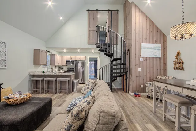 a view of a livingroom with furniture and furniture
