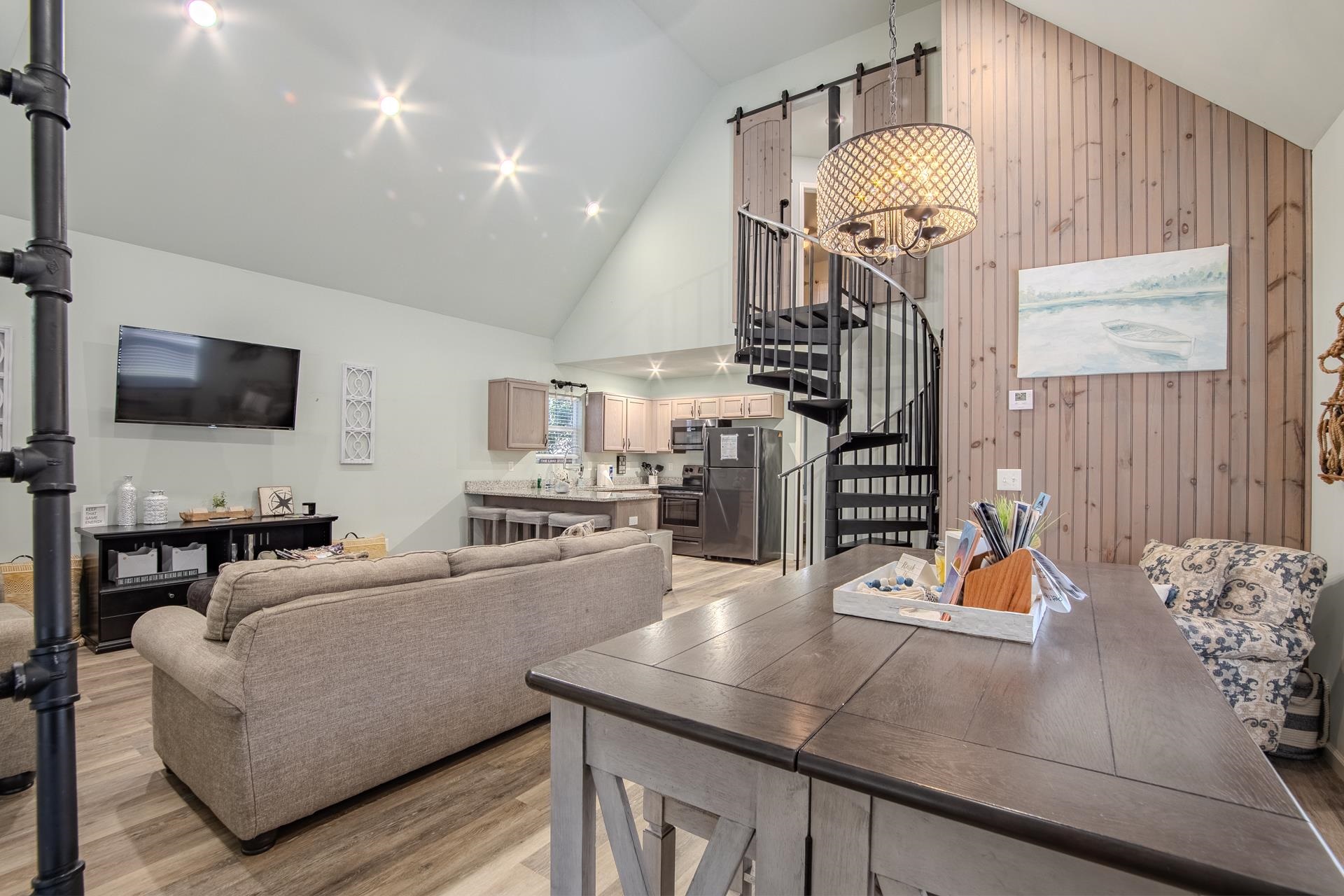 25 Bogey Loop Counce, TN 38326 - Photo 9 of 37 a living room with furniture and a chandelier
