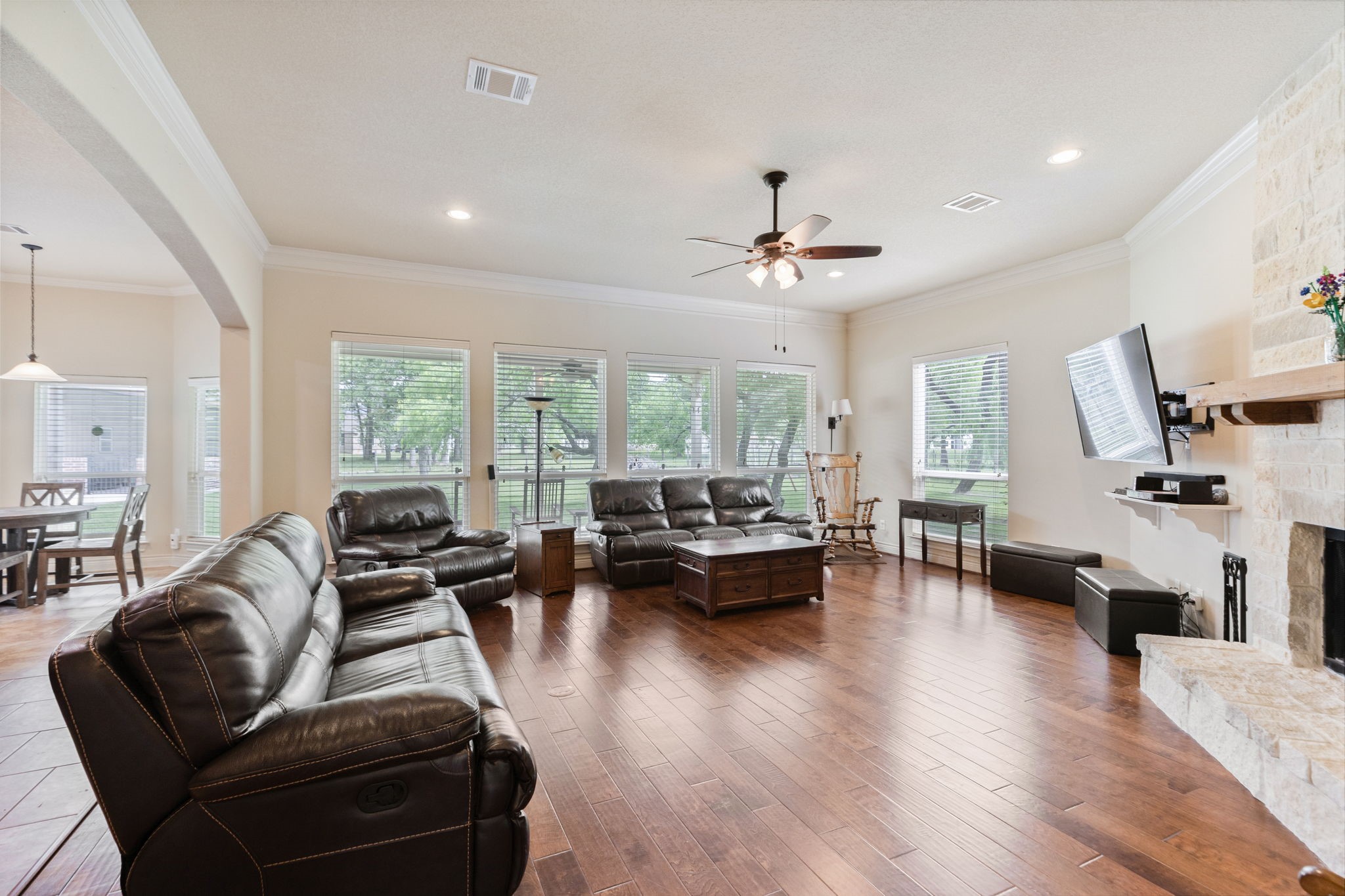 101 Pin Oak Lane Hempstead, TX 77445 - Photo 13 of 50 a living room with furniture large window and wooden floor