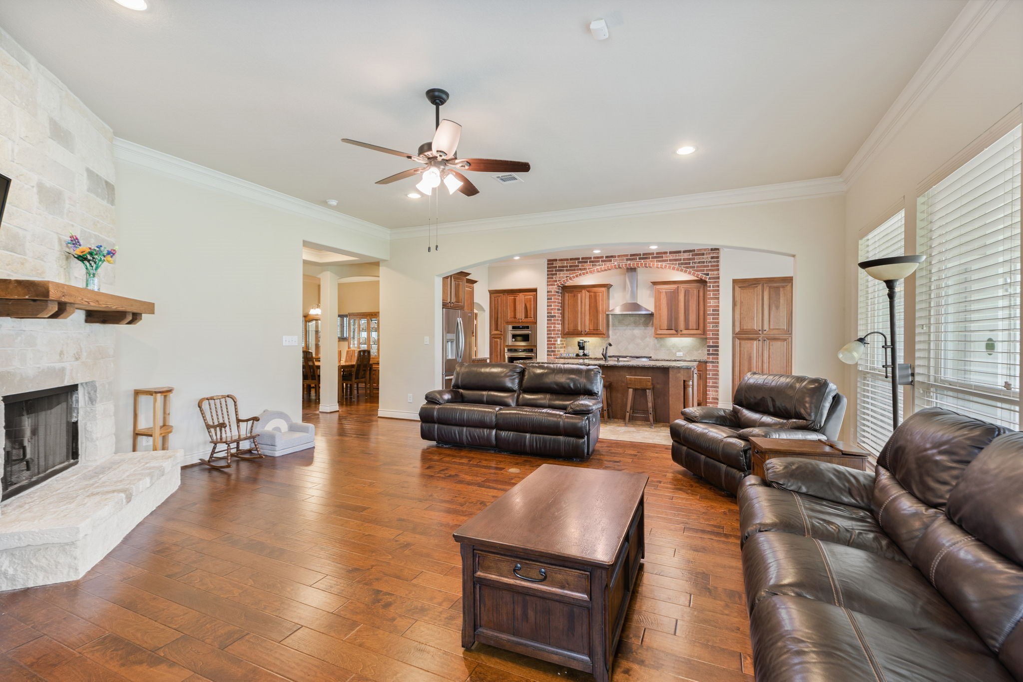 101 Pin Oak Lane Hempstead, TX 77445 - Photo 15 of 50 a living room with fireplace furniture and a flat screen tv