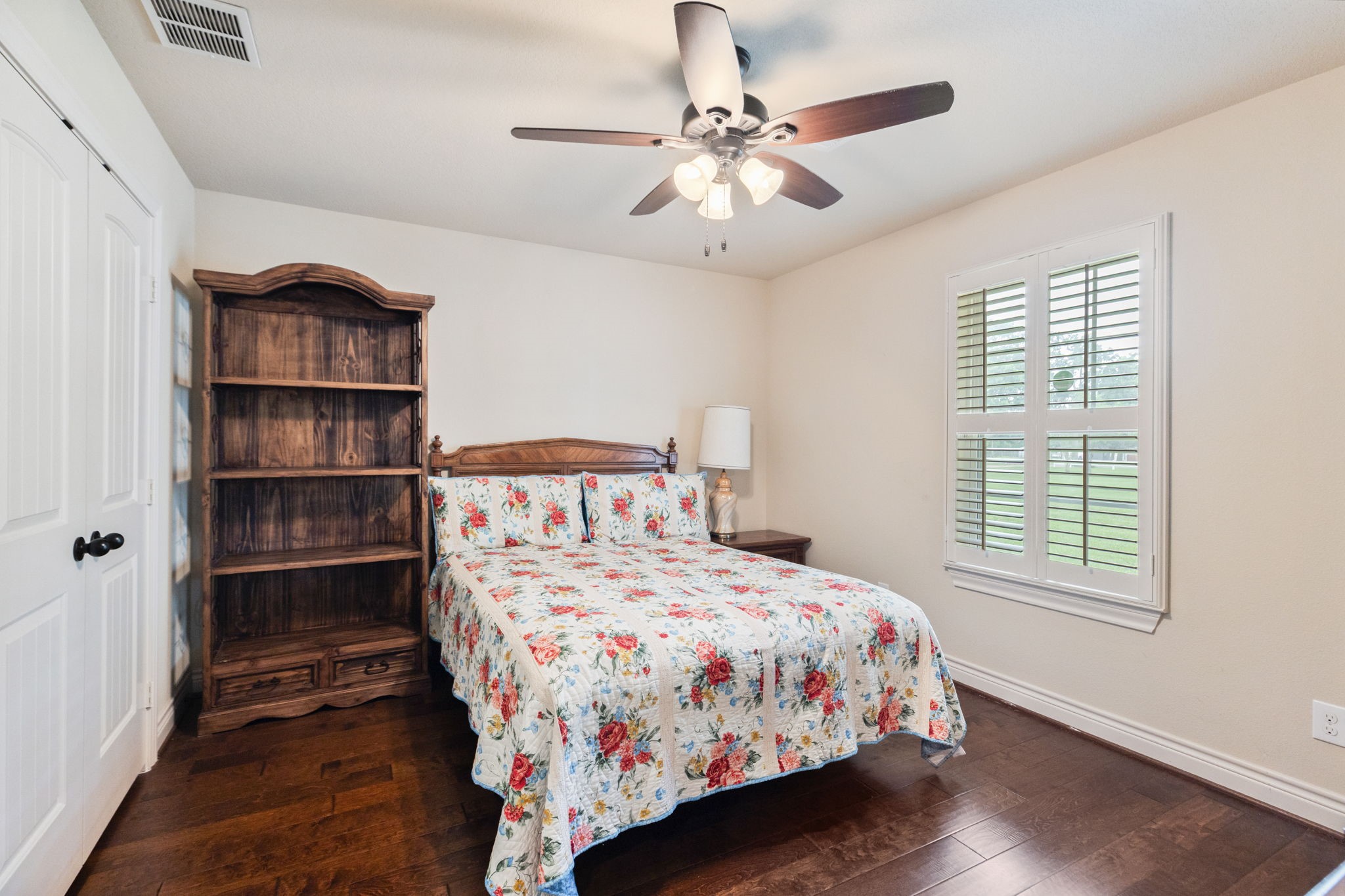 101 Pin Oak Lane Hempstead, TX 77445 - Photo 23 of 50 a bedroom with a bed closet and a window