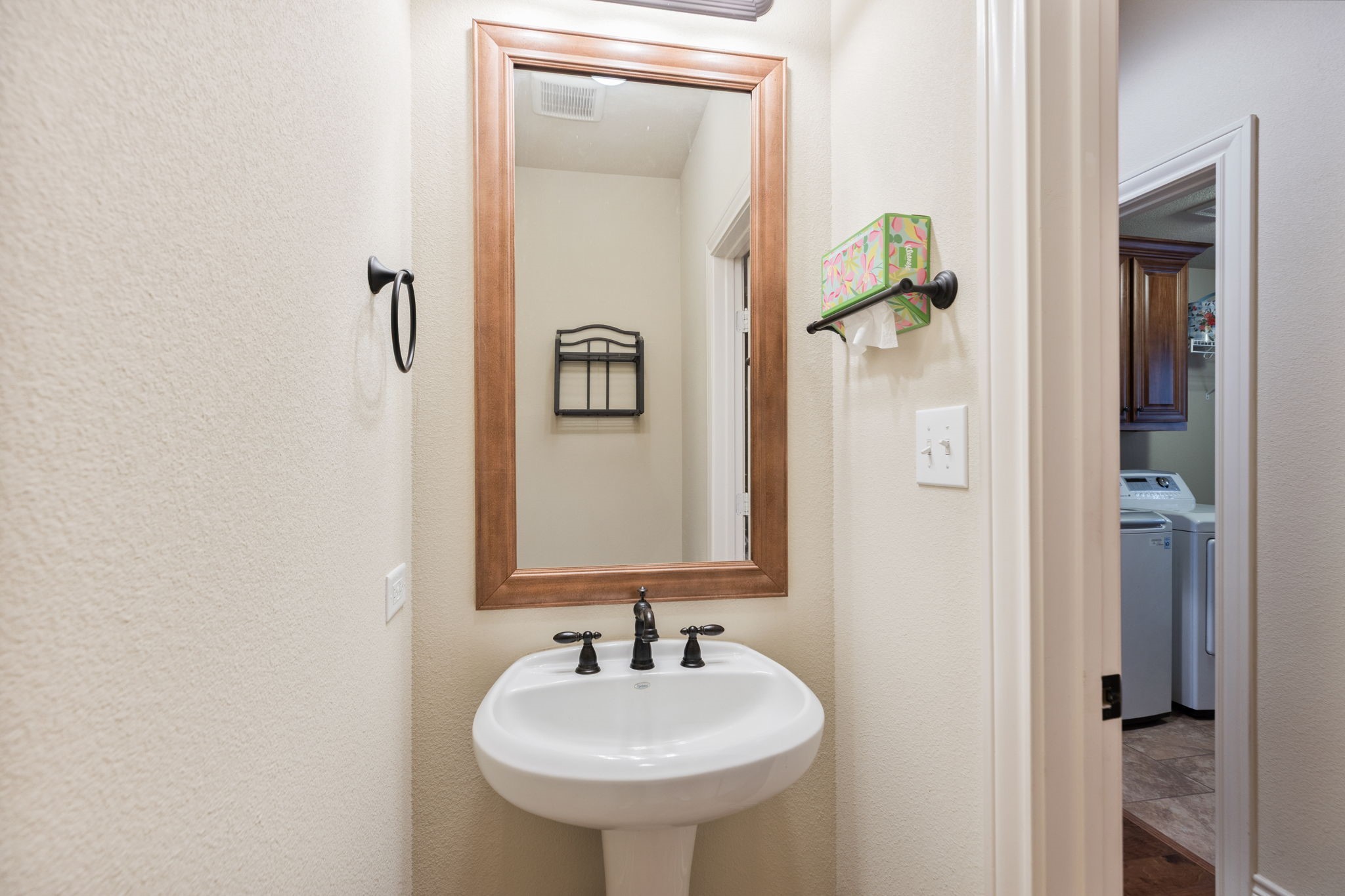 101 Pin Oak Lane Hempstead, TX 77445 - Photo 26 of 50 a bathroom with a sink and a mirror
