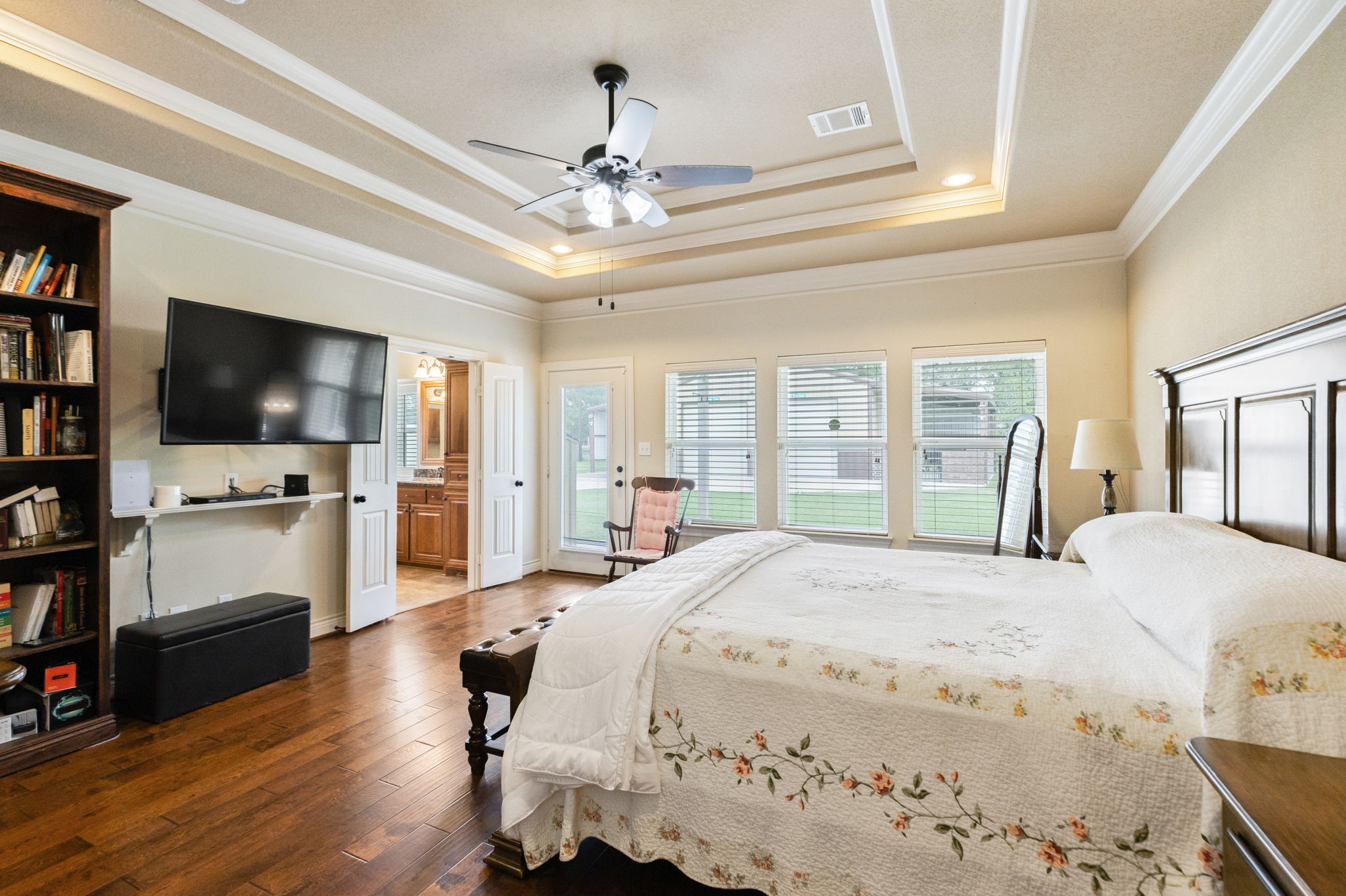 101 Pin Oak Lane Hempstead, TX 77445 - Photo 27 of 50 a spacious bedroom with a bed and a flat screen tv