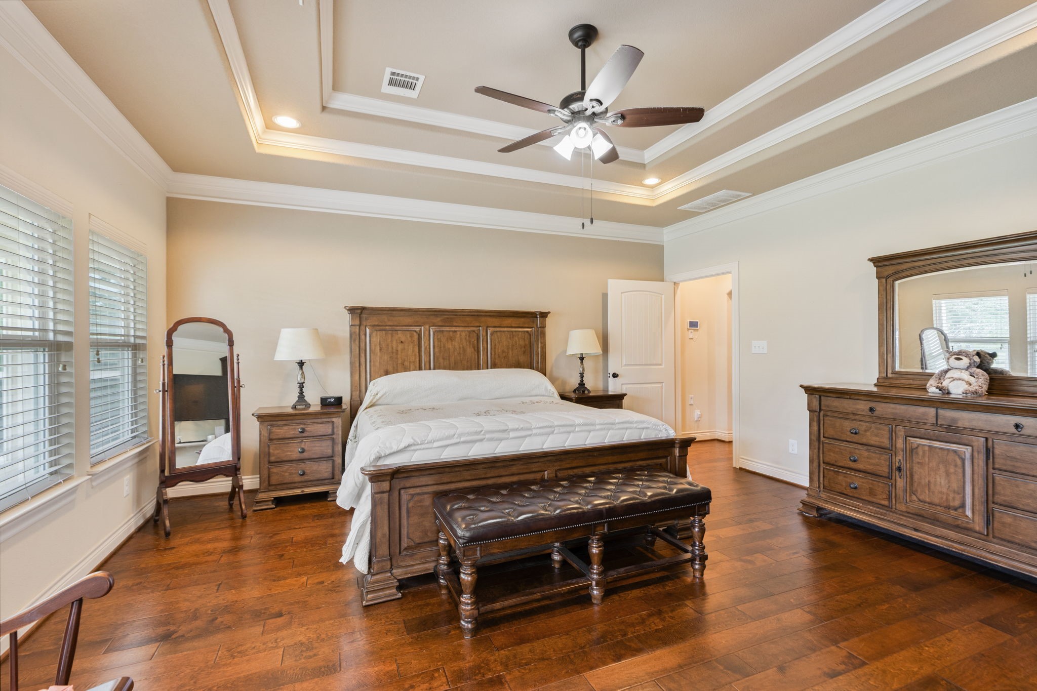 101 Pin Oak Lane Hempstead, TX 77445 - Photo 28 of 50 a bedroom with a bed and wooden floor