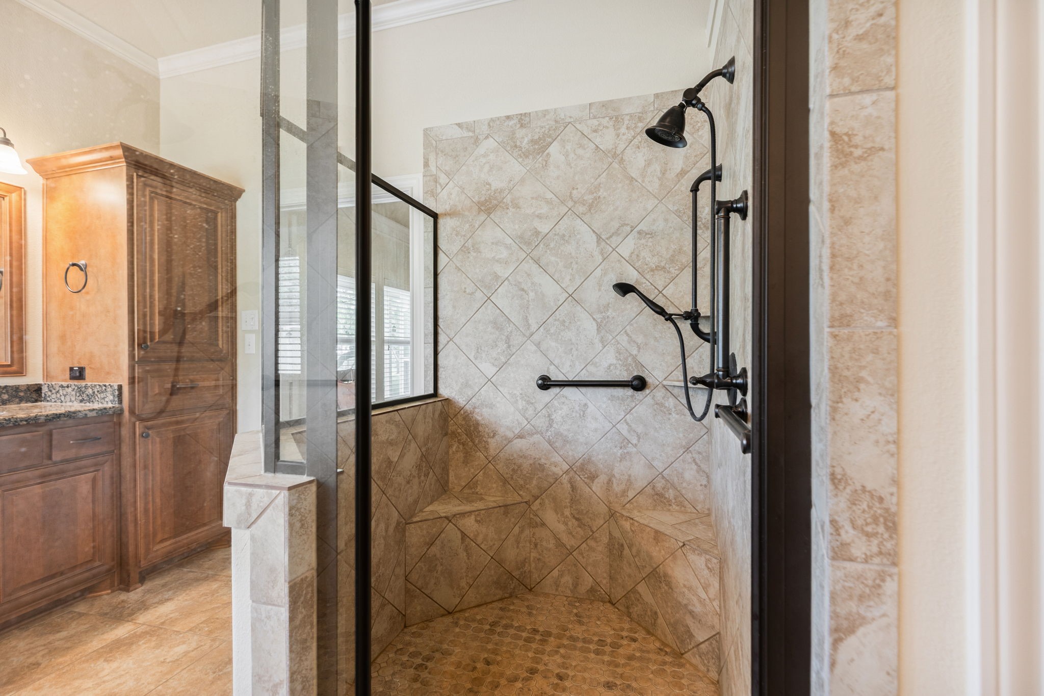 101 Pin Oak Lane Hempstead, TX 77445 - Photo 31 of 50 a bathroom with a shower and a glass door